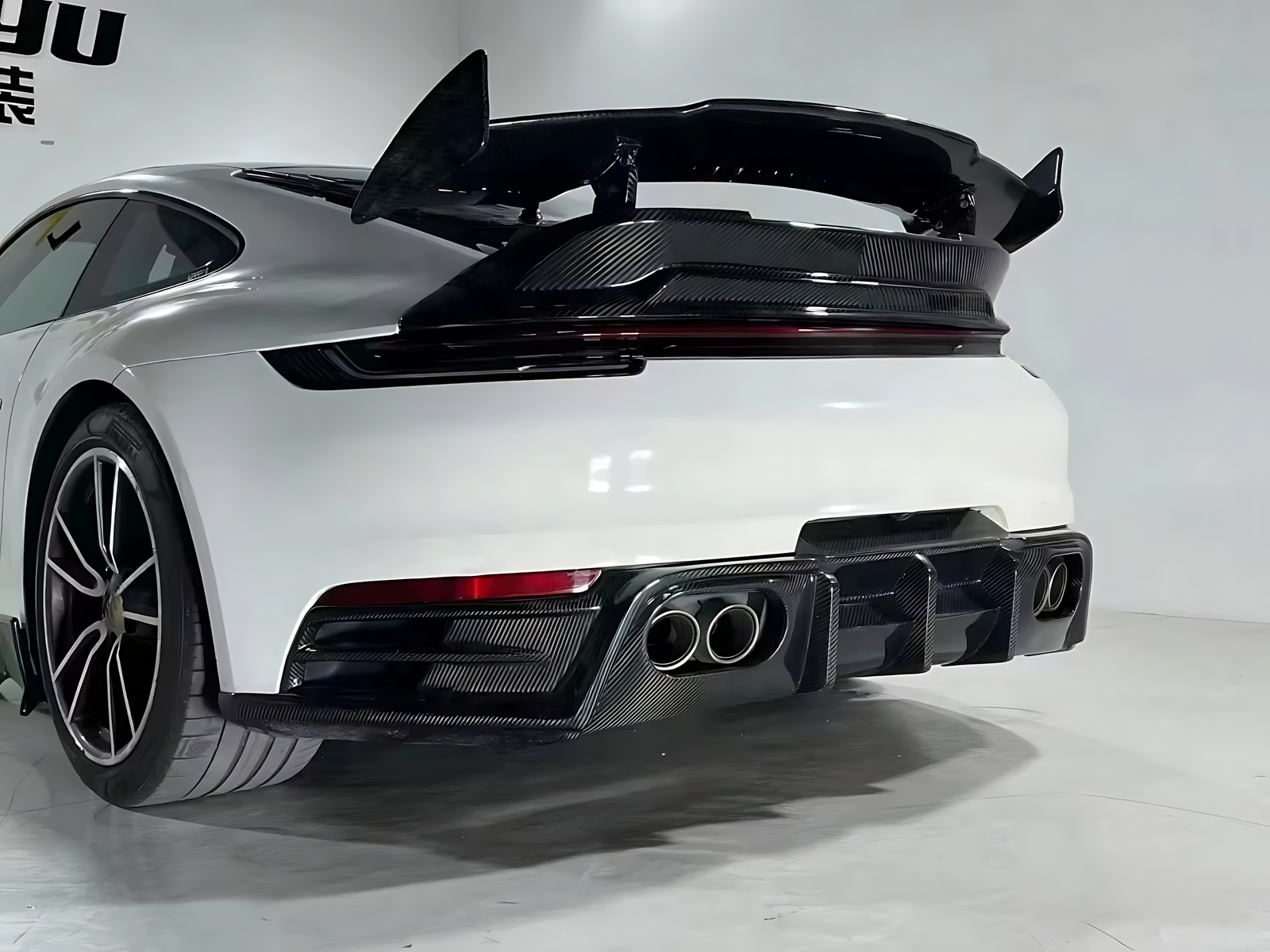 4_916ee284-9f5c-4749-a579-32576a3bf59a Porsche 911 992 Carbon Fiber Bras-Style Body Kit | Front & Rear Bumpers, Diffuser, Spoiler Upgrade (2020+) - Image 1