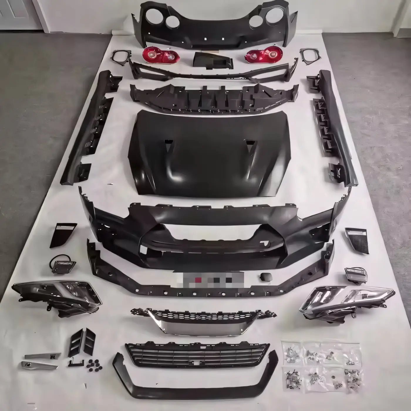 nissan-r35-gt-r-full-nismo-style-carbon-fiber-body-kit-bumpers-skirts-spoiler-hood-lights-vents-kits-performance-115 Nissan R35 GT-R Full Nismo-Style Carbon Fiber Body Kit (Bumpers, Skirts, Spoiler, Hood, Lights, Vents) - Image 1